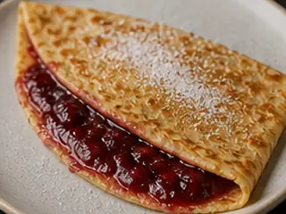 Crêpe con mermelada en la carta de Lunzar Bar Alicante