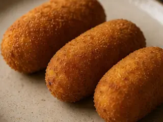 Croquetas en la carta de Lunzar Bar Alicante